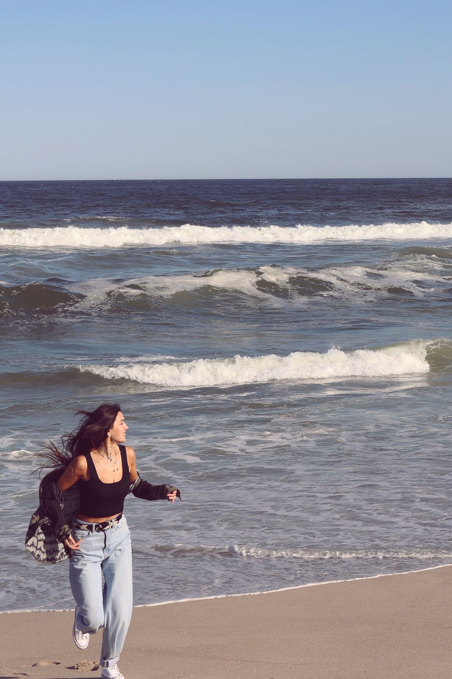 An unhurried moment of movement beside ocean waves